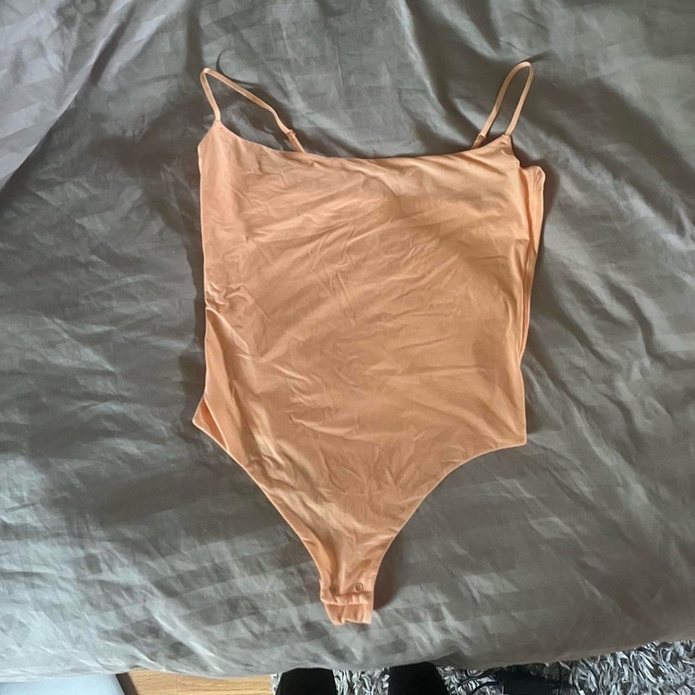 Skims fits everybody orange bodysuit size large